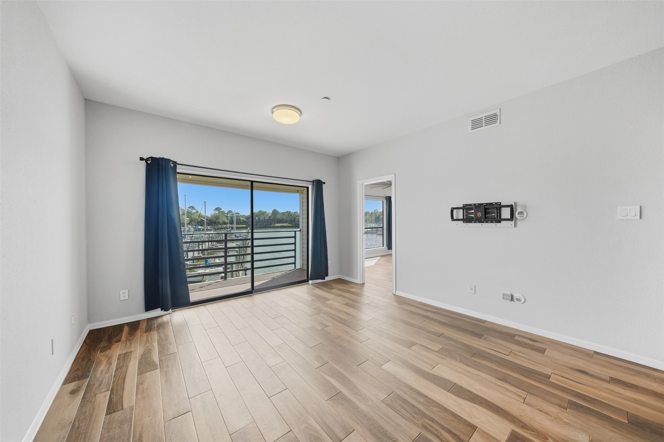 793 Davis Road, Unit 116 League City, TX 77573 - Photo 7 of 31 a view of an empty room with a window