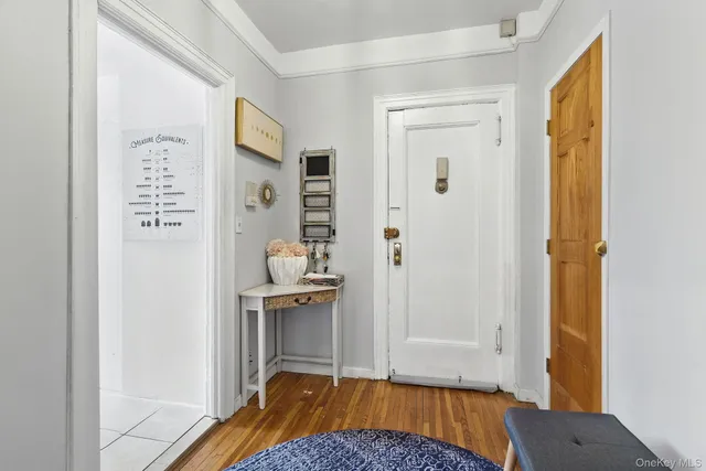 a bedroom with a bed and a table in it