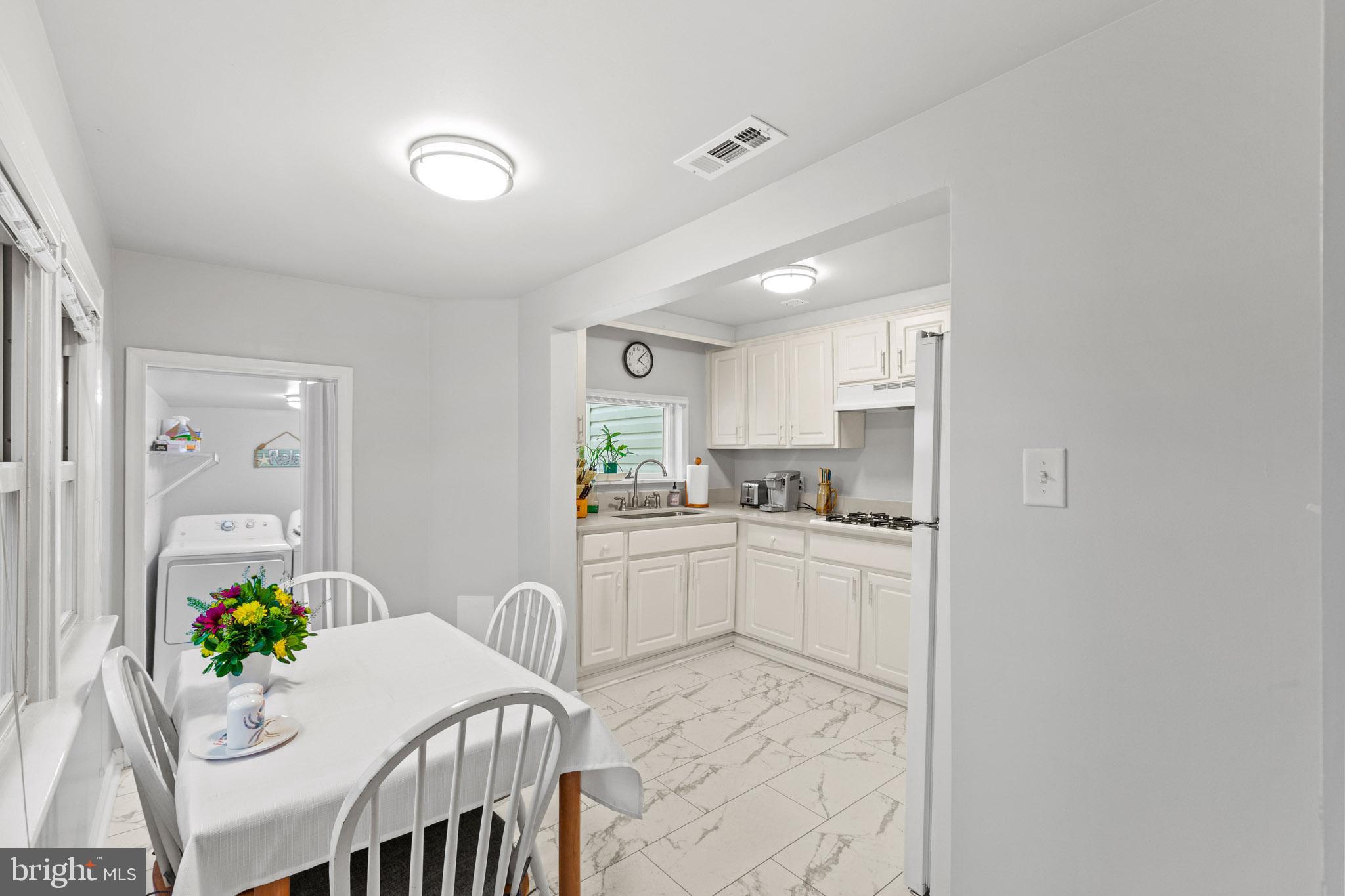 16101 Piney Point Road Piney Point, MD 20674 - Photo 11 of 24 Dining to Kitchen