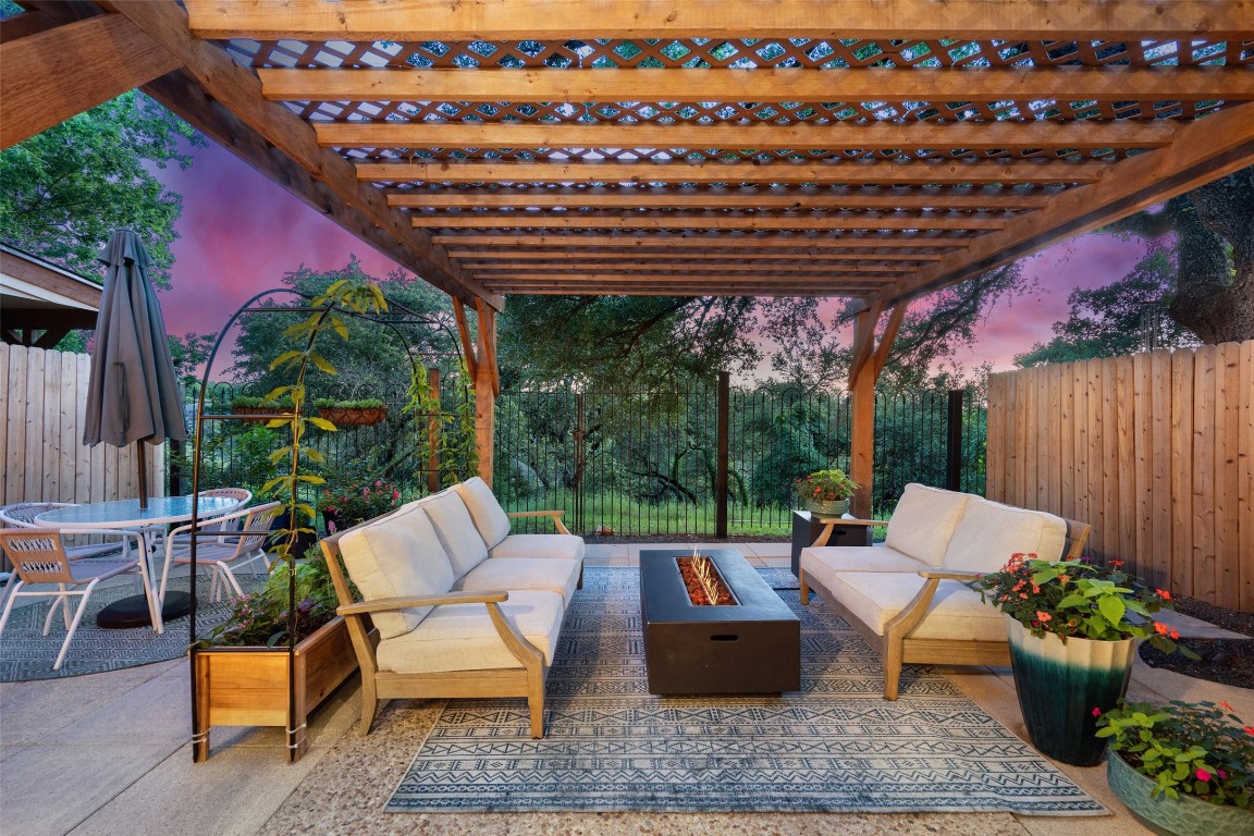 a view of a patio with couches and chairs