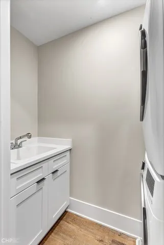 a view of a hallway with washer and dryer