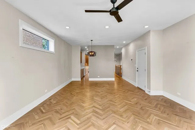 a kitchen with stainless steel appliances granite countertop a sink refrigerator and cabinets