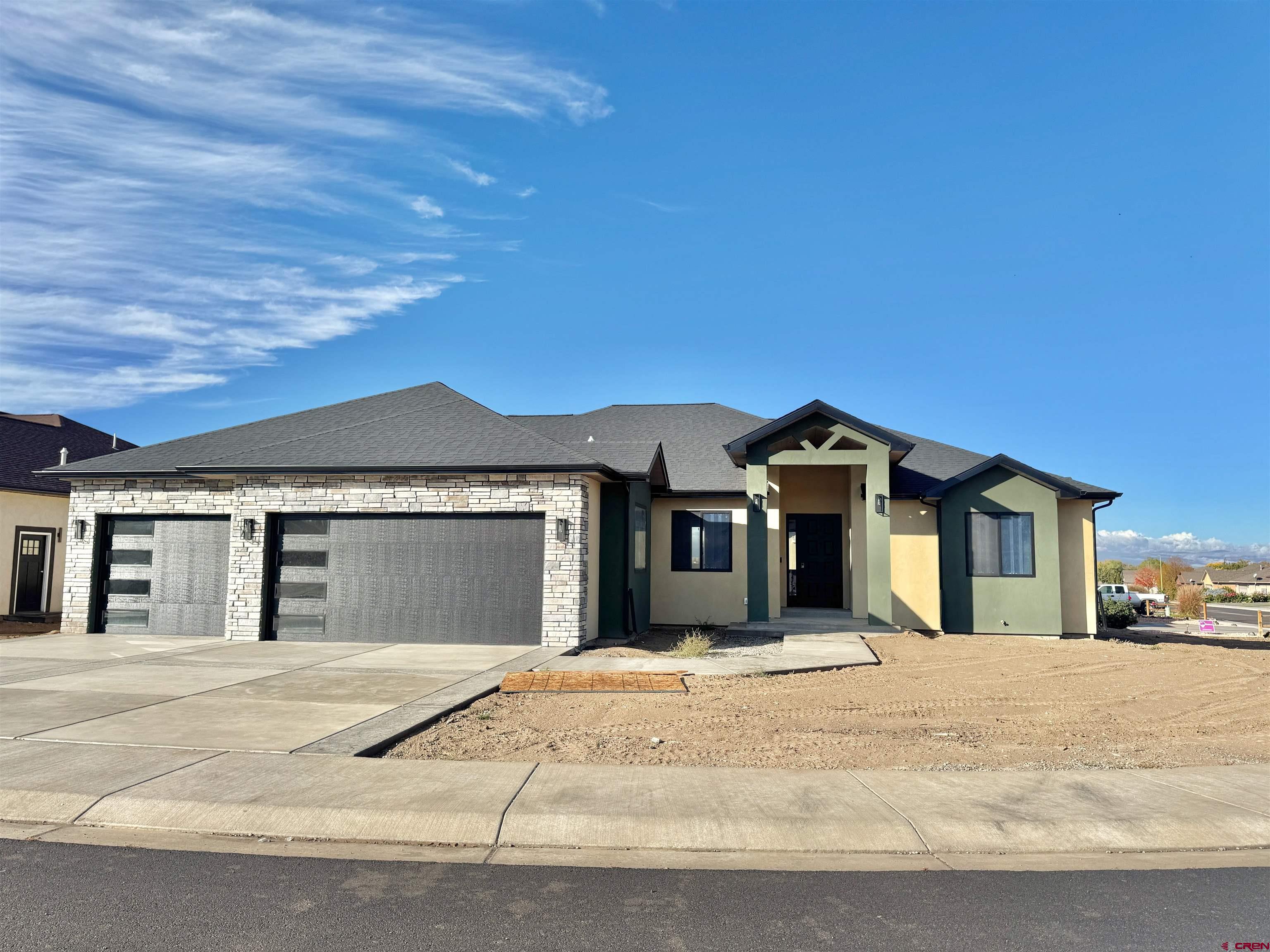 1508 Criterion Street Delta, CO 81416 - Photo 1 of 27 a front view of a house with a outdoor space