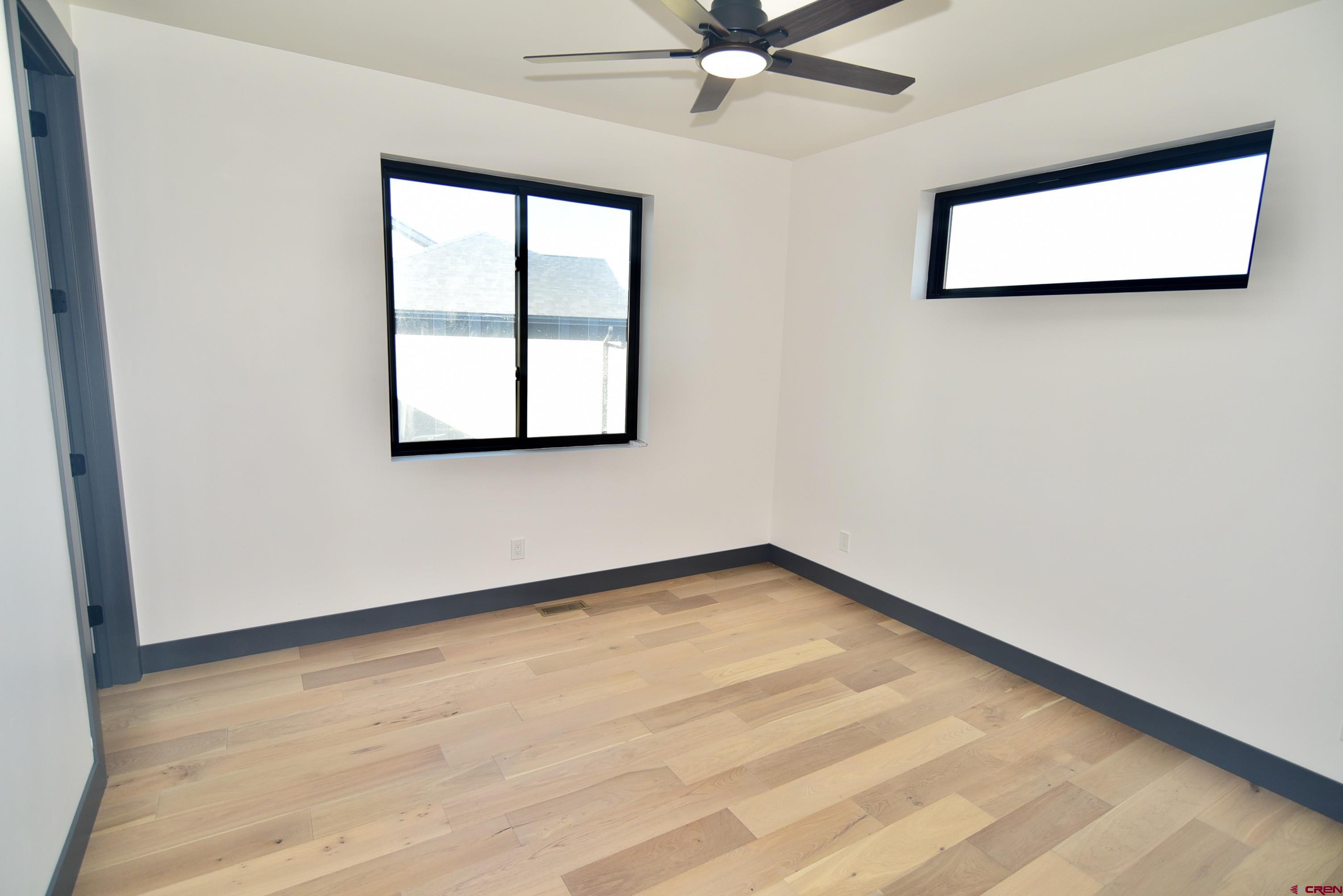 1508 Criterion Street Delta, CO 81416 - Photo 21 of 27 an empty room with a window