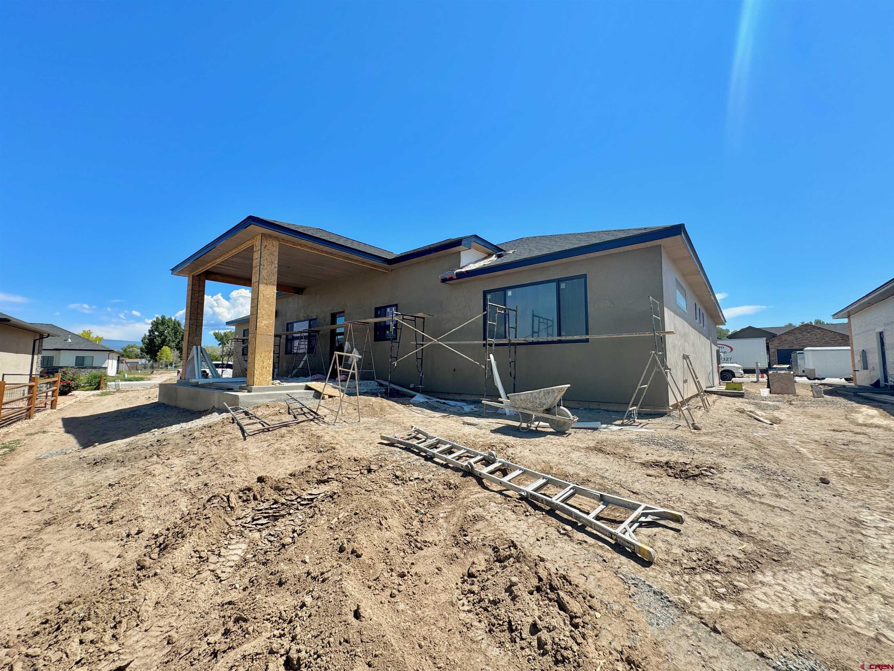 1508 Criterion Street Delta, CO 81416 - Photo 27 of 27 a view of a house with snow on the road
