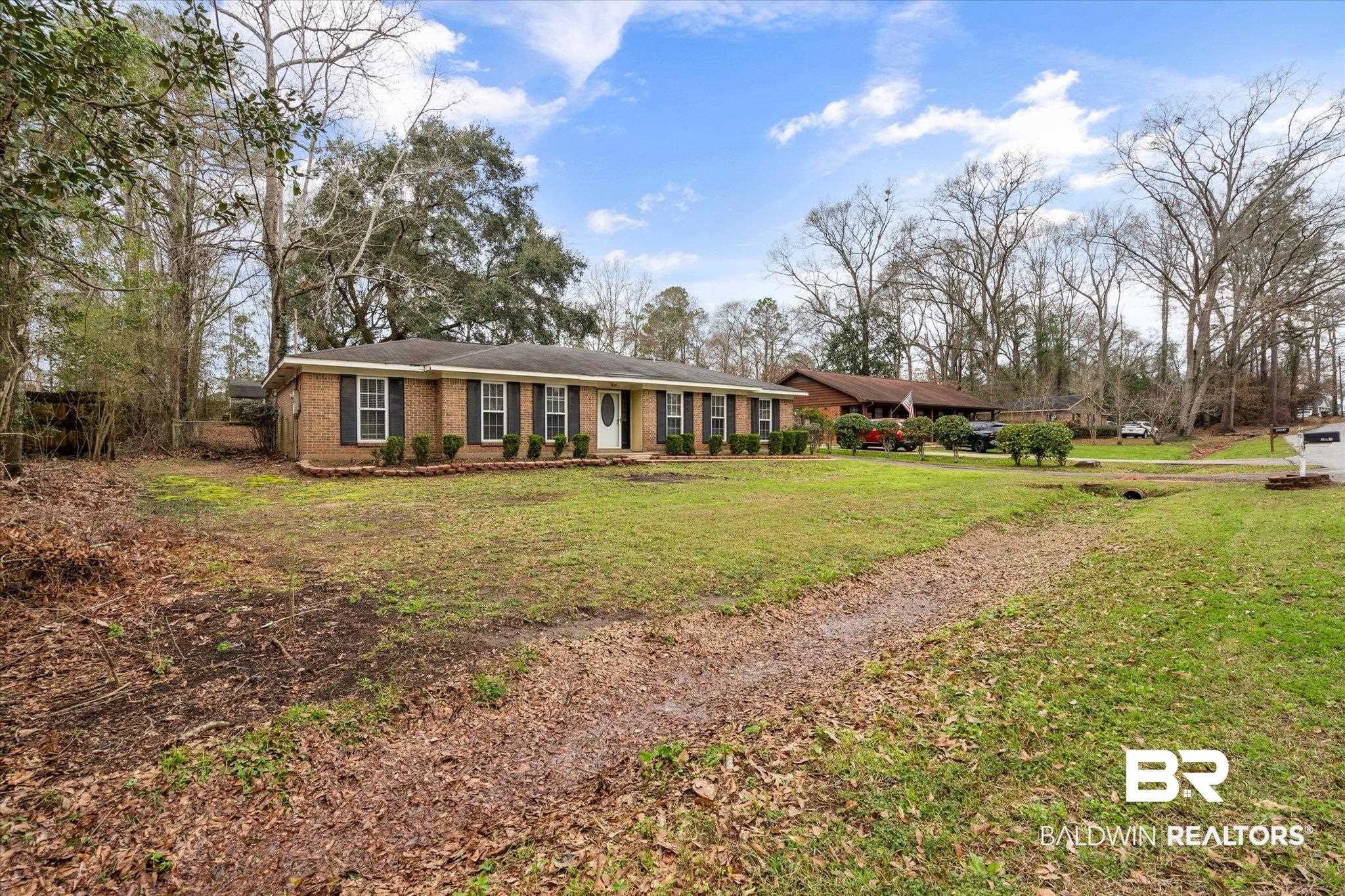 3541 Winston Drive Semmes, AL 36575 - Photo 20 of 20 View of front of property with brick siding and a front yard