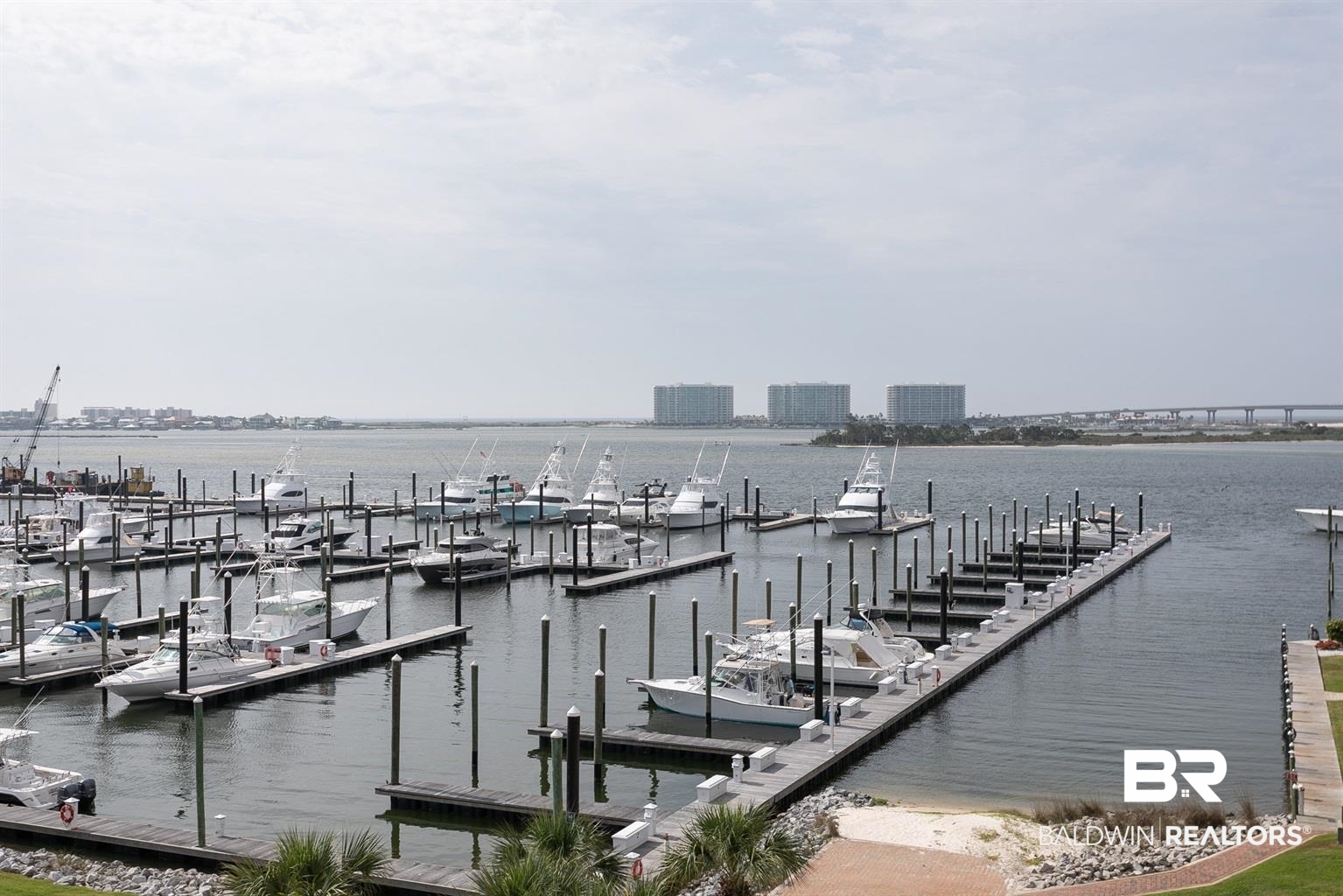 27800 Canal Road, Unit 411 Orange Beach, AL 36561 - Photo 36 of 49 Marina with multiple boat slips, concrete docking, and direct water access