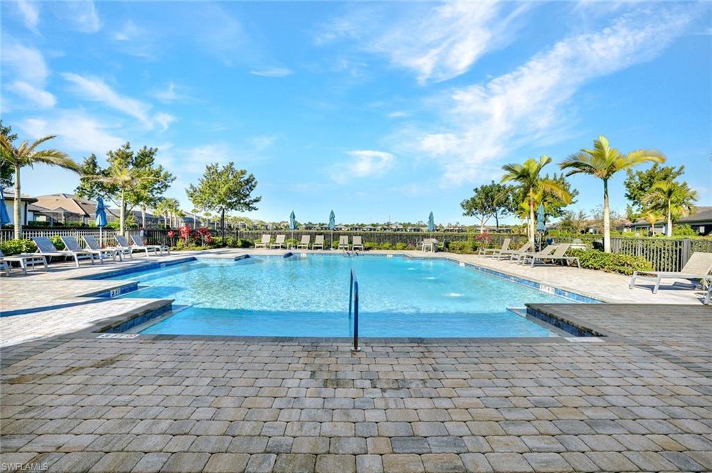 2240 Yellowfin Circle Naples, FL 34114 - Photo 28 of 38 Community pool featuring a patio area