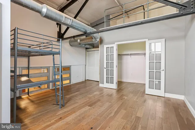 a view of outdoor space with wooden floor