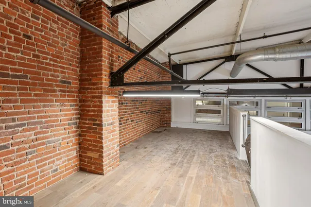 a view of a room with racks on the wall