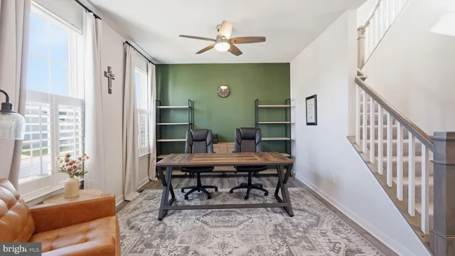 a workspace with furniture and window