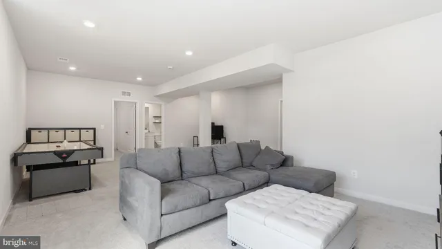 a living room with furniture and a couch