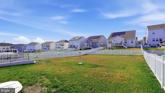 a view of a house with a big yard