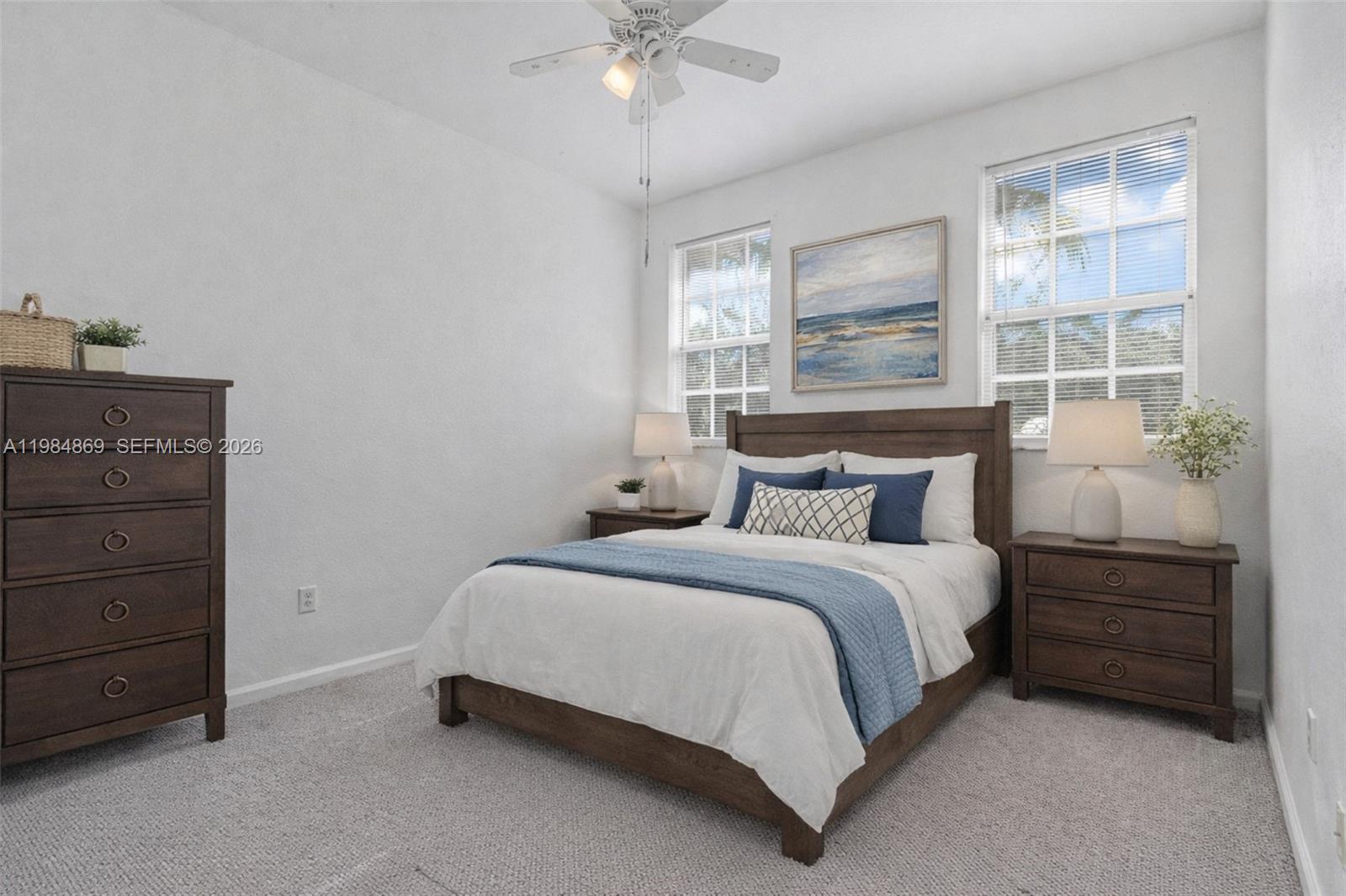 2109 Northeast 3rd Court Homestead, FL 33033 - Photo 16 of 19 a bedroom with a bed and a window