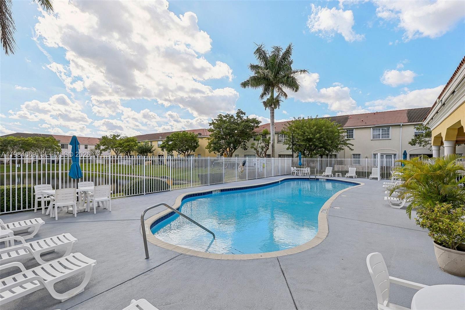 2109 Northeast 3rd Court Homestead, FL 33033 - Photo 18 of 19 a view of a swimming pool with a patio