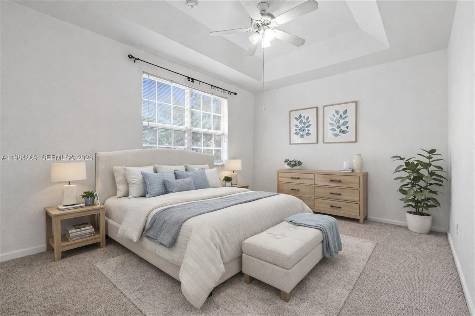 2109 Northeast 3rd Court Homestead, FL 33033 - Photo 10 of 19 a bedroom with a bed and a chandelier