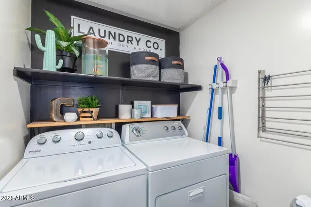 a utility room with dryer and washer