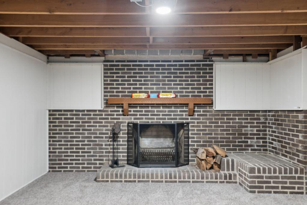 1000 McNaughten Road Columbus, OH 43213 - Photo 38 of 81 Basement Rec Room w/ fireplace