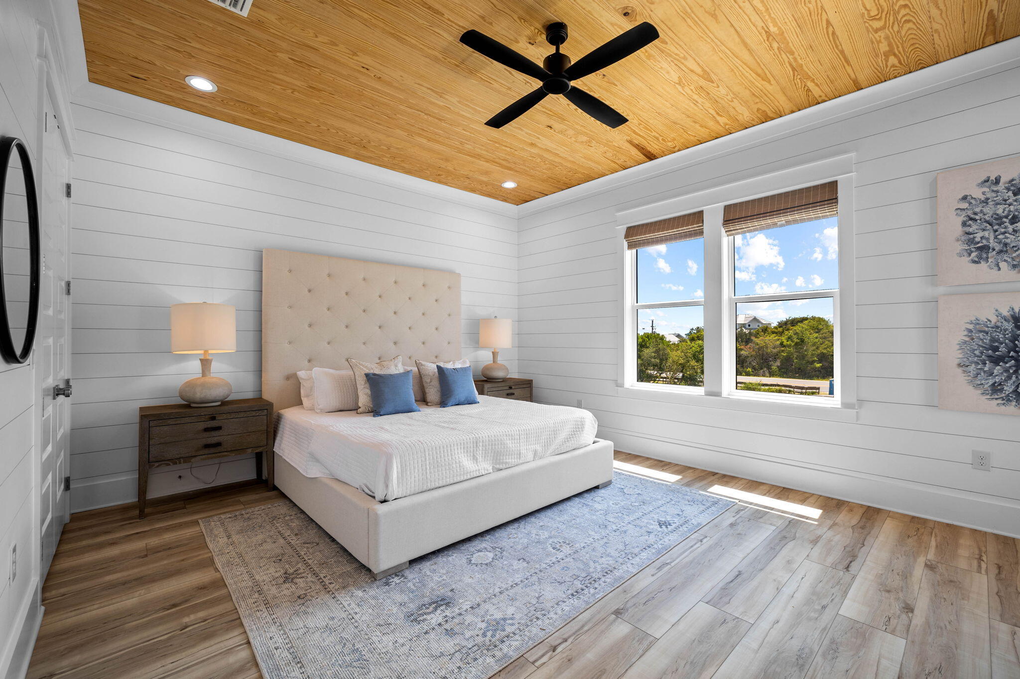 169 Baird Road Santa Rosa Beach, FL 32459 - Photo 33 of 93 a spacious bedroom with a large bed and a window