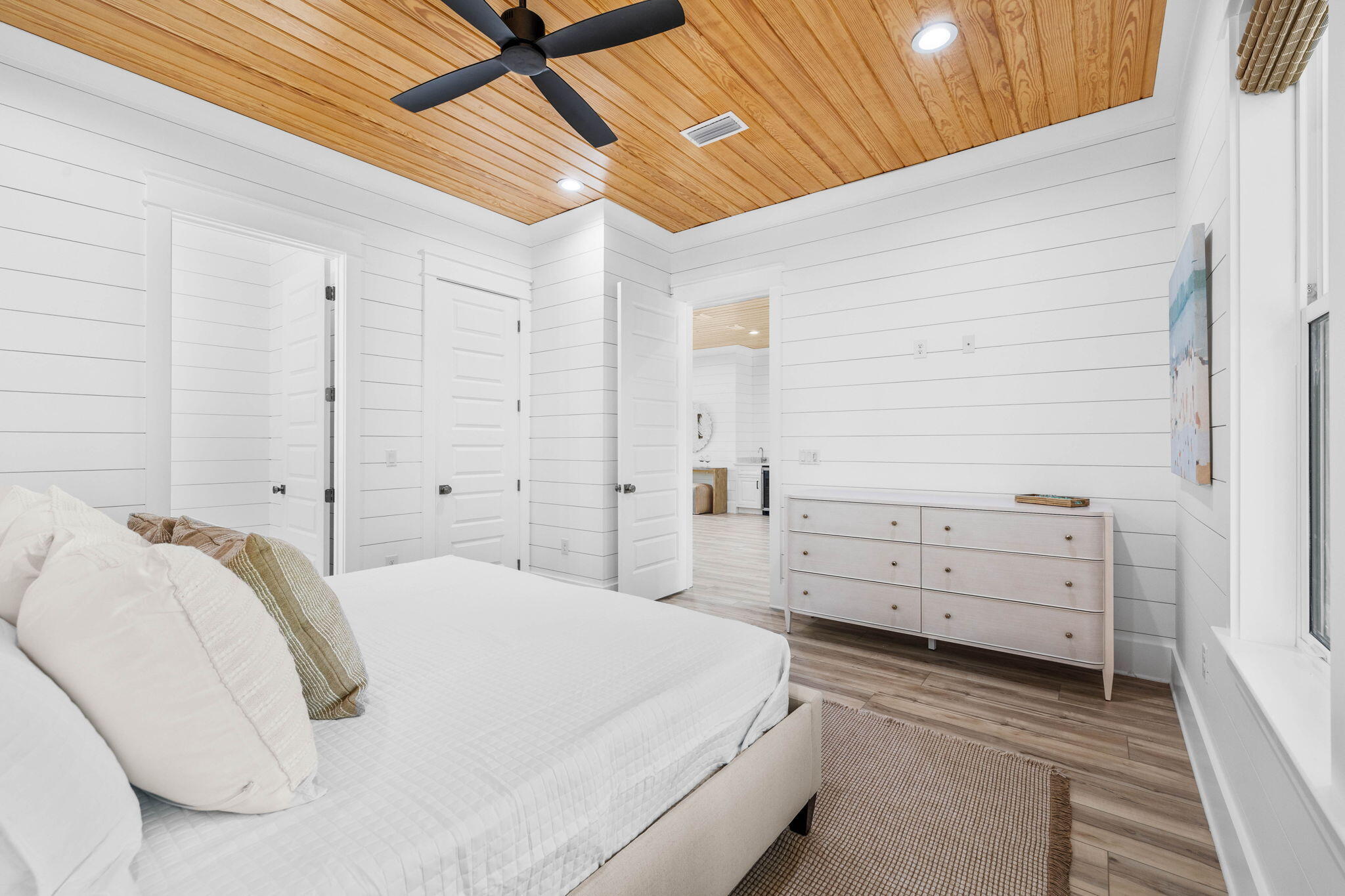 169 Baird Road Santa Rosa Beach, FL 32459 - Photo 55 of 93 a bedroom with a bed and a dresser