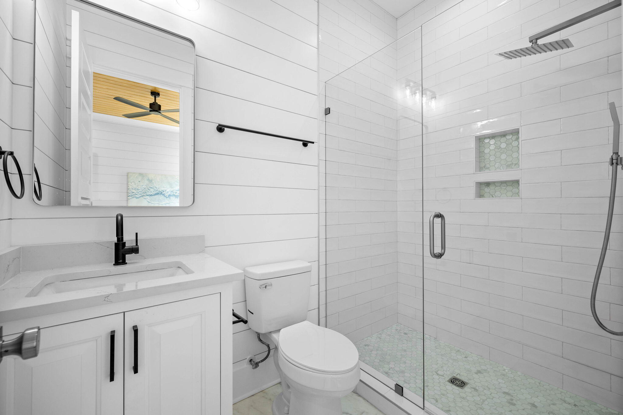 169 Baird Road Santa Rosa Beach, FL 32459 - Photo 62 of 93 a bathroom with a granite countertop sink a toilet and a shower