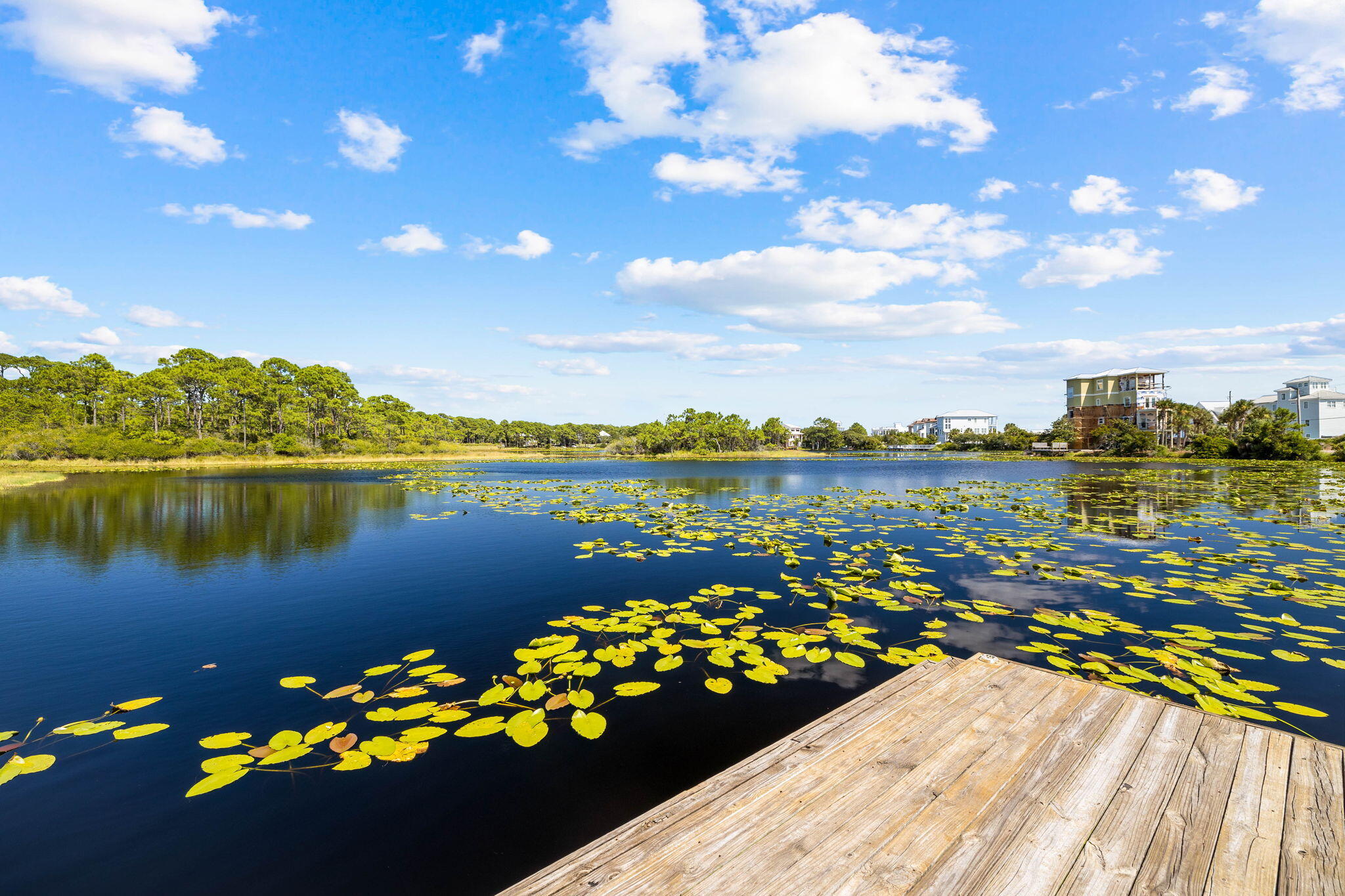 169 Baird Road Santa Rosa Beach, FL 32459 - Photo 92 of 93 a view of a lake with a table and chairs
