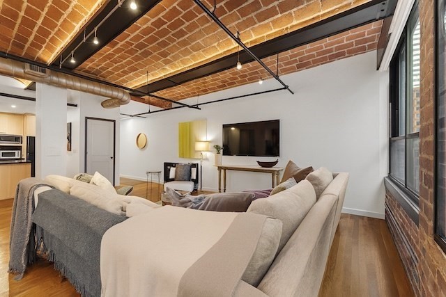 121 Beach Boston Ma, Unit 502 Boston, MA 02111 - Photo 4 of 21 a hotel room with two beds and a flat screen tv