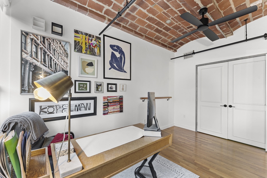 121 Beach Boston Ma, Unit 502 Boston, MA 02111 - Photo 10 of 21 a dinning area with furniture and wooden floor