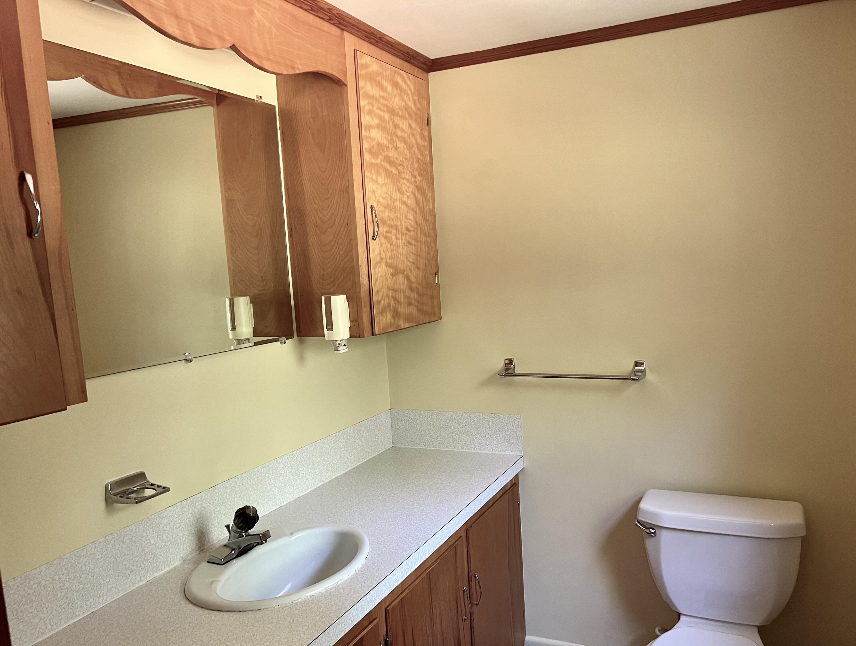 37 East Ridge Road Southwest Harbor, ME 04679 - Photo 18 of 45 Half bath off of the primary bedroom