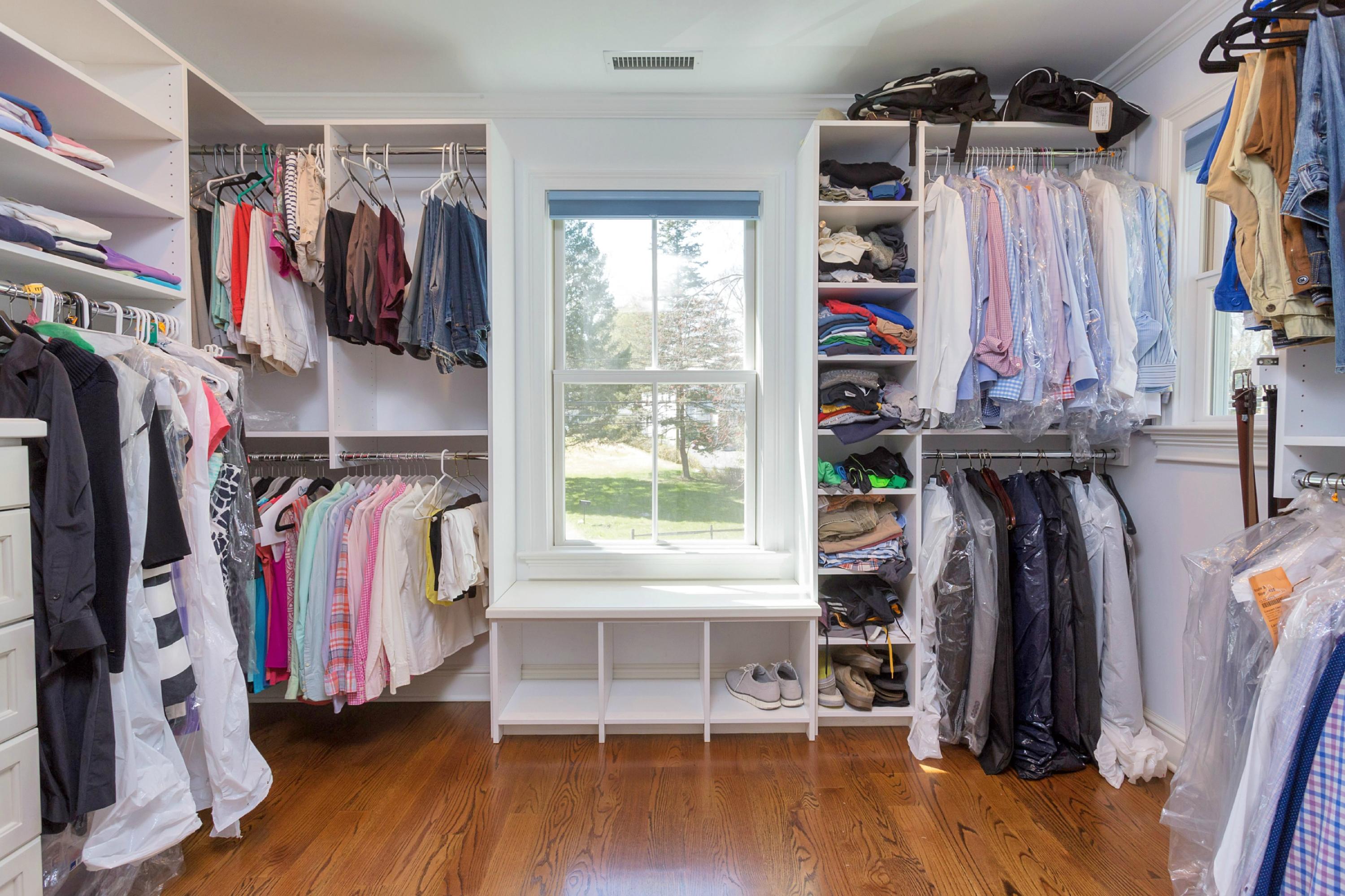 31 Edgewood Road Darien, CT 06820 - Photo 12 of 25 a view of walk in closet with clothes and shoes