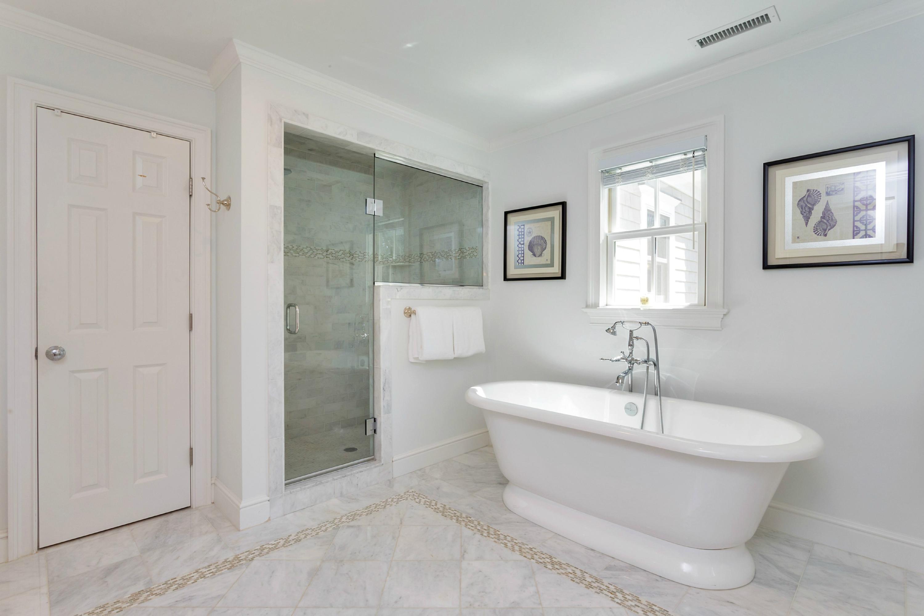 31 Edgewood Road Darien, CT 06820 - Photo 13 of 25 a white bath tub sitting next to a bathroom sink