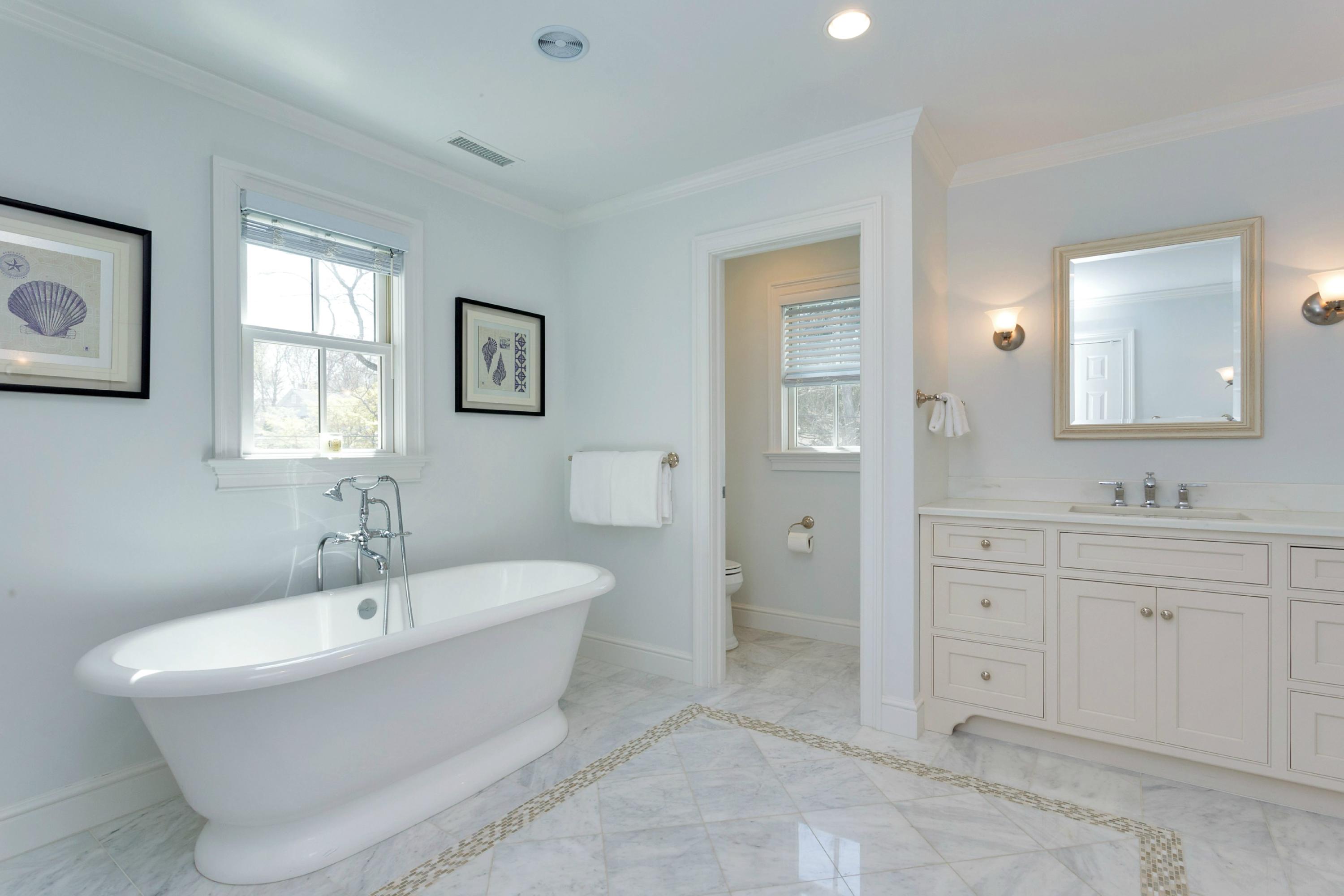 31 Edgewood Road Darien, CT 06820 - Photo 14 of 25 a bathroom with a sink and a bathtub