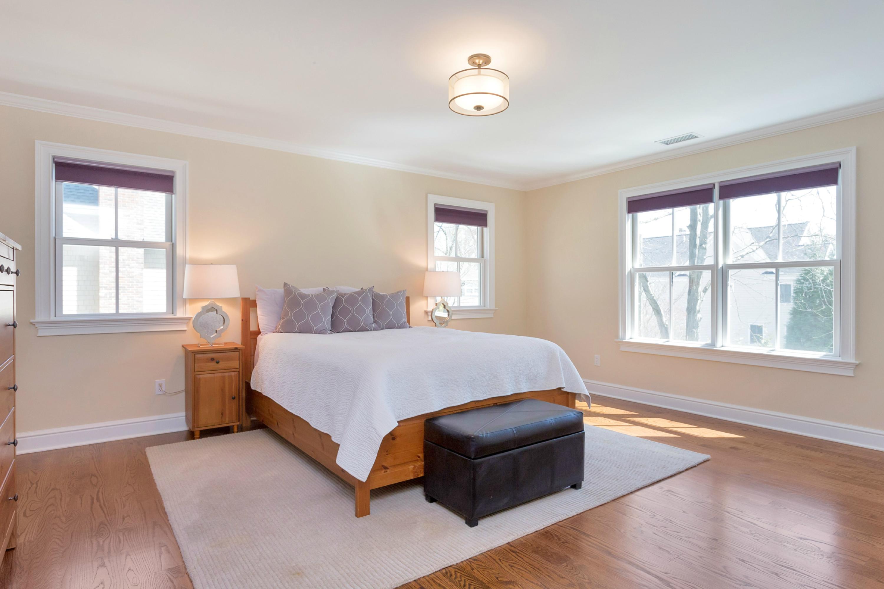 31 Edgewood Road Darien, CT 06820 - Photo 16 of 25 a bed room with a bed and a window