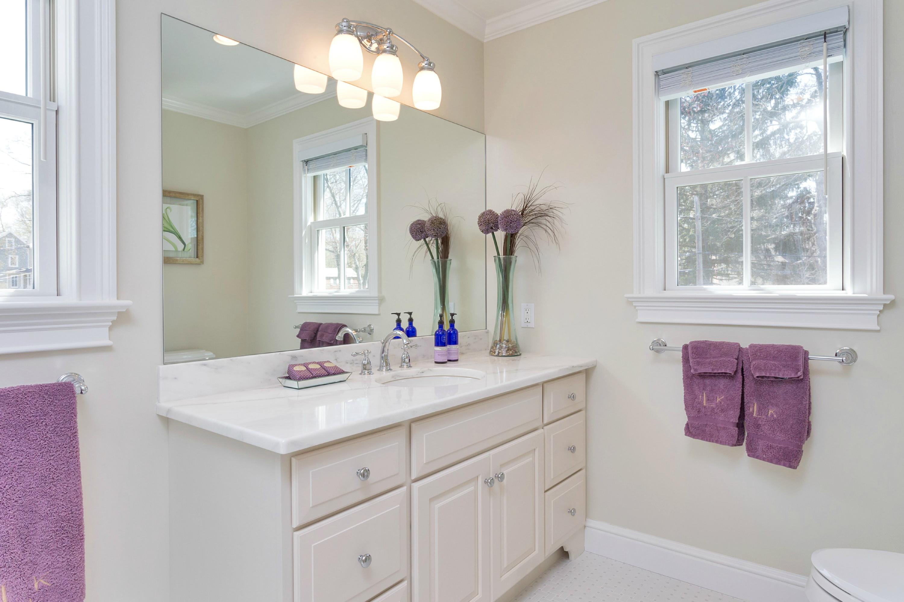 31 Edgewood Road Darien, CT 06820 - Photo 17 of 25 a bathroom with a sink vanity and a mirror
