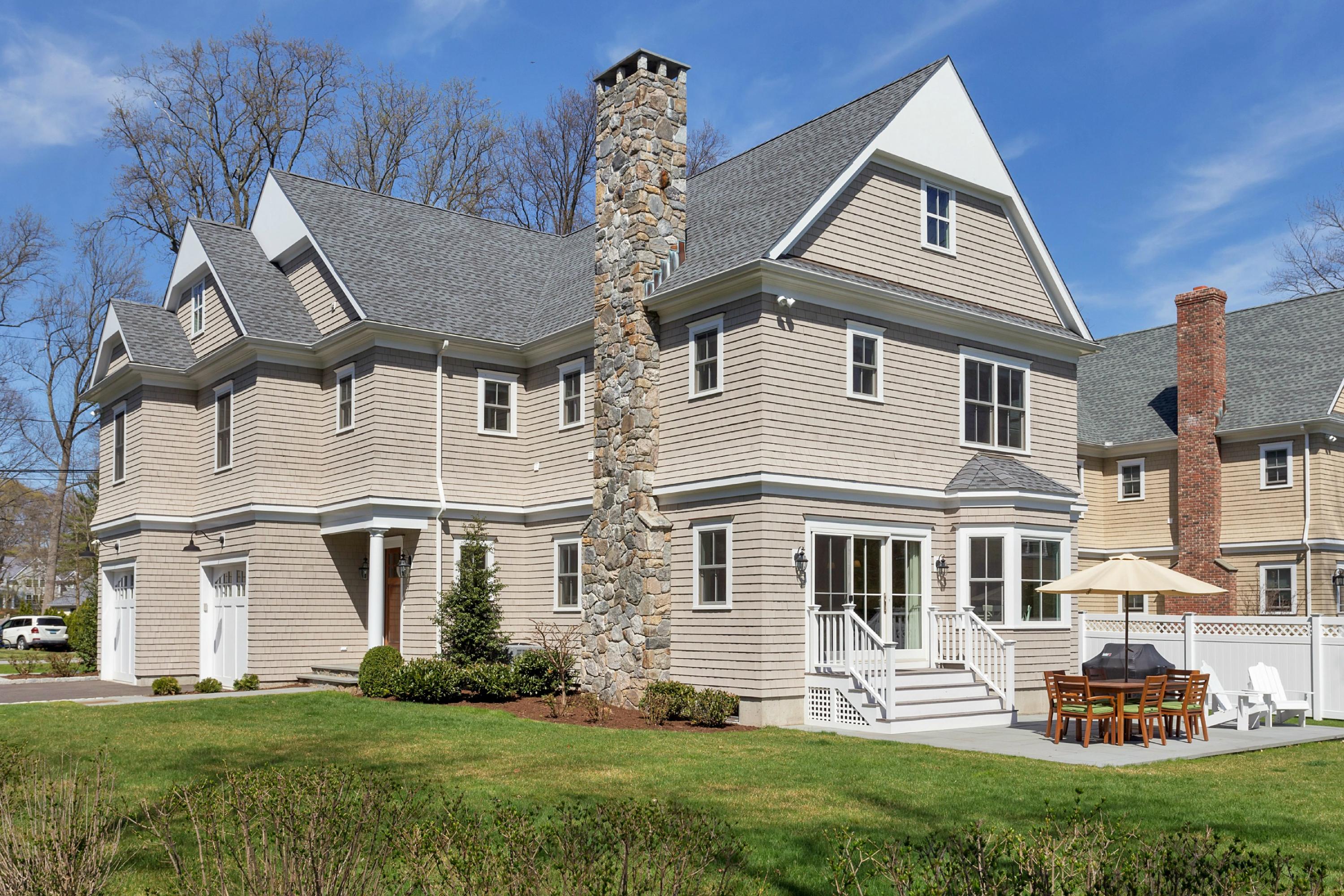 31 Edgewood Road Darien, CT 06820 - Photo 21 of 25 a front view of a house with a yard