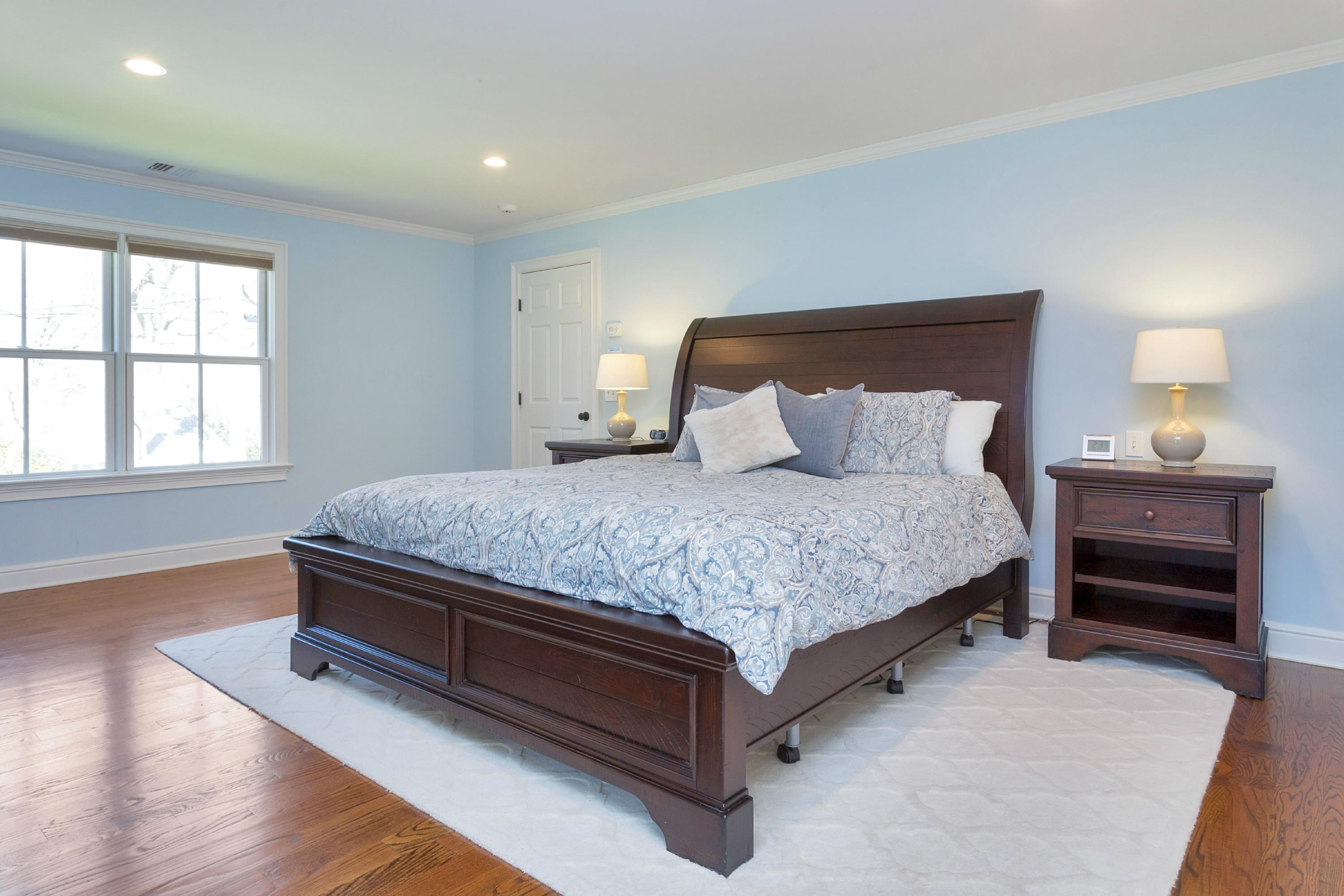 31 Edgewood Road Darien, CT 06820 - Photo 10 of 25 a bedroom with a bed and a window