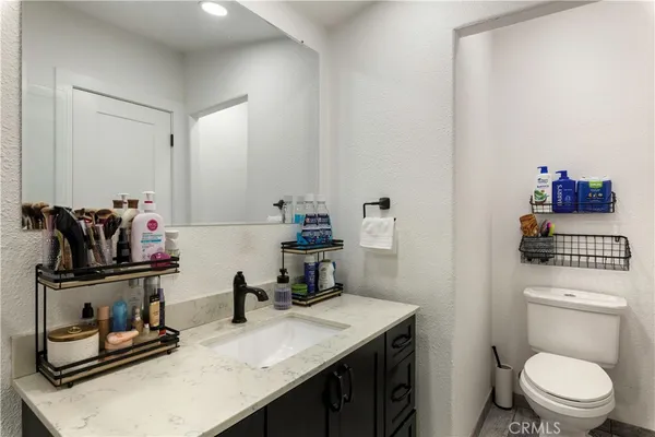 a front view of a house with a wooden fence