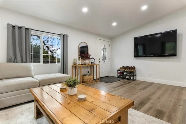 a kitchen with stainless steel appliances a refrigerator stove and microwave