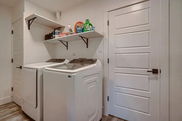 a utility room with dryer and washer