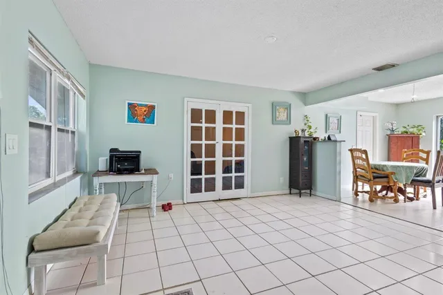 a view of livingroom with furniture and window