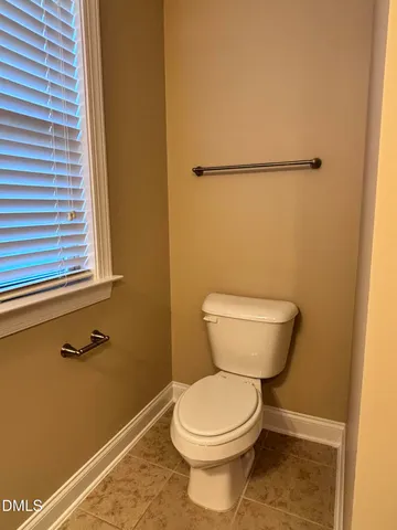 a bathroom with a toilet