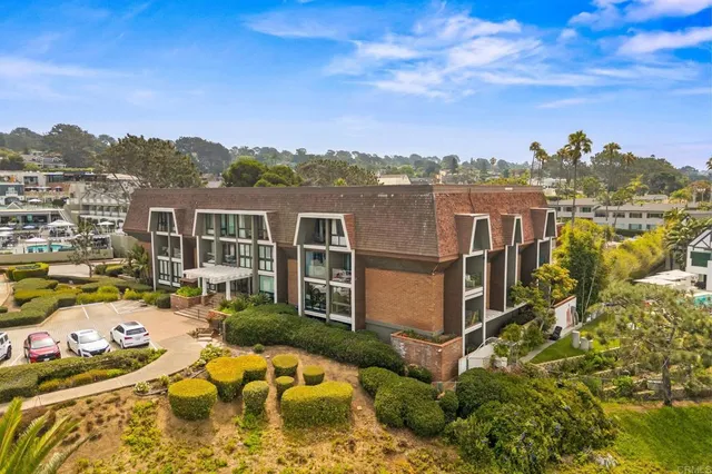 a view of a lake with a city in the background