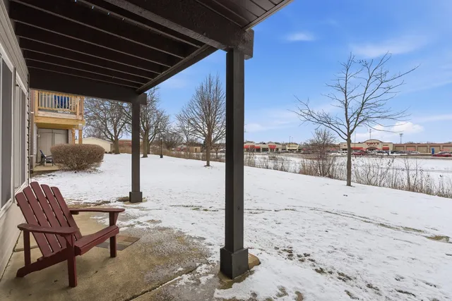 a view of porch with a patio
