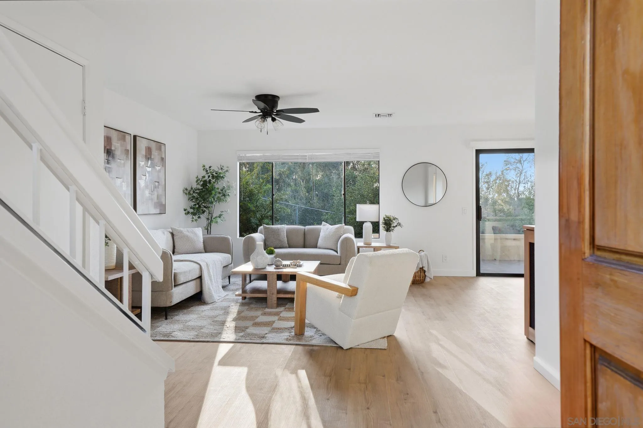 10450 Ridgewater Lane San Diego, CA 92131 - Photo 16 of 47 a living room with furniture and a window