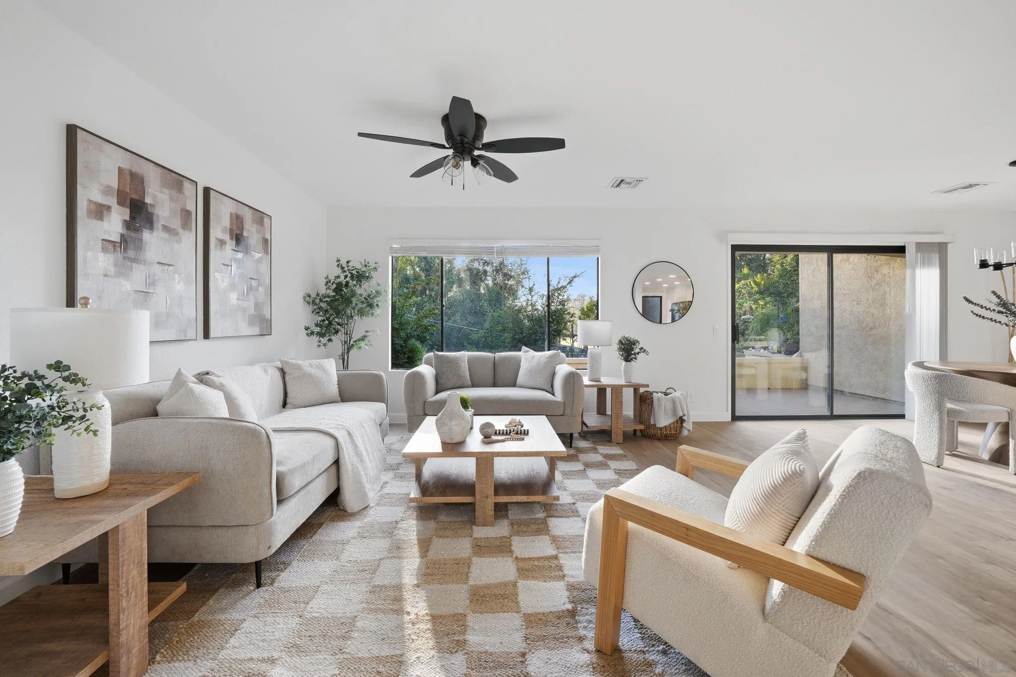 10450 Ridgewater Lane San Diego, CA 92131 - Photo 2 of 47 a living room with furniture and a large window