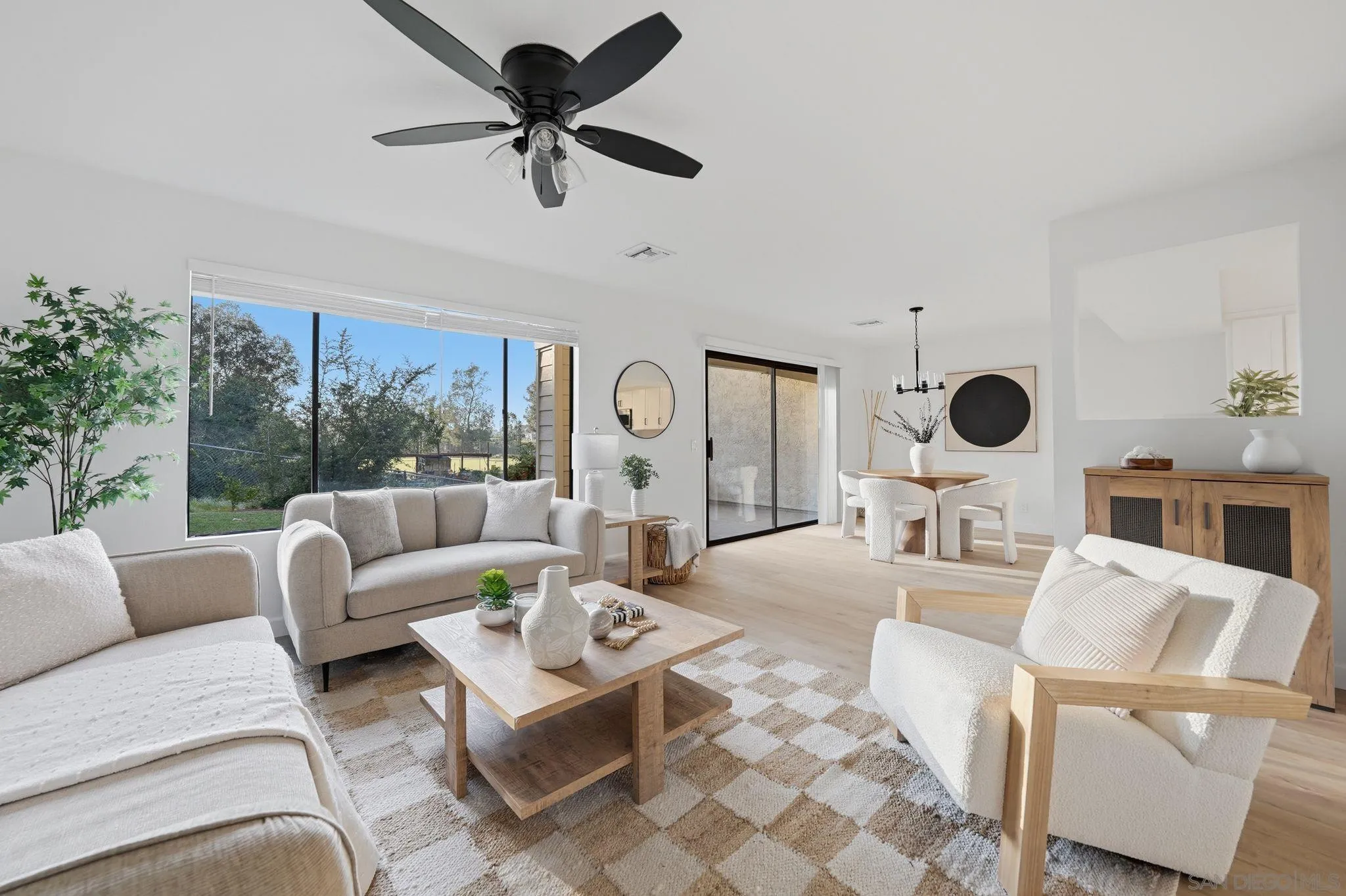 10450 Ridgewater Lane San Diego, CA 92131 - Photo 3 of 47 a living room with furniture and a large window