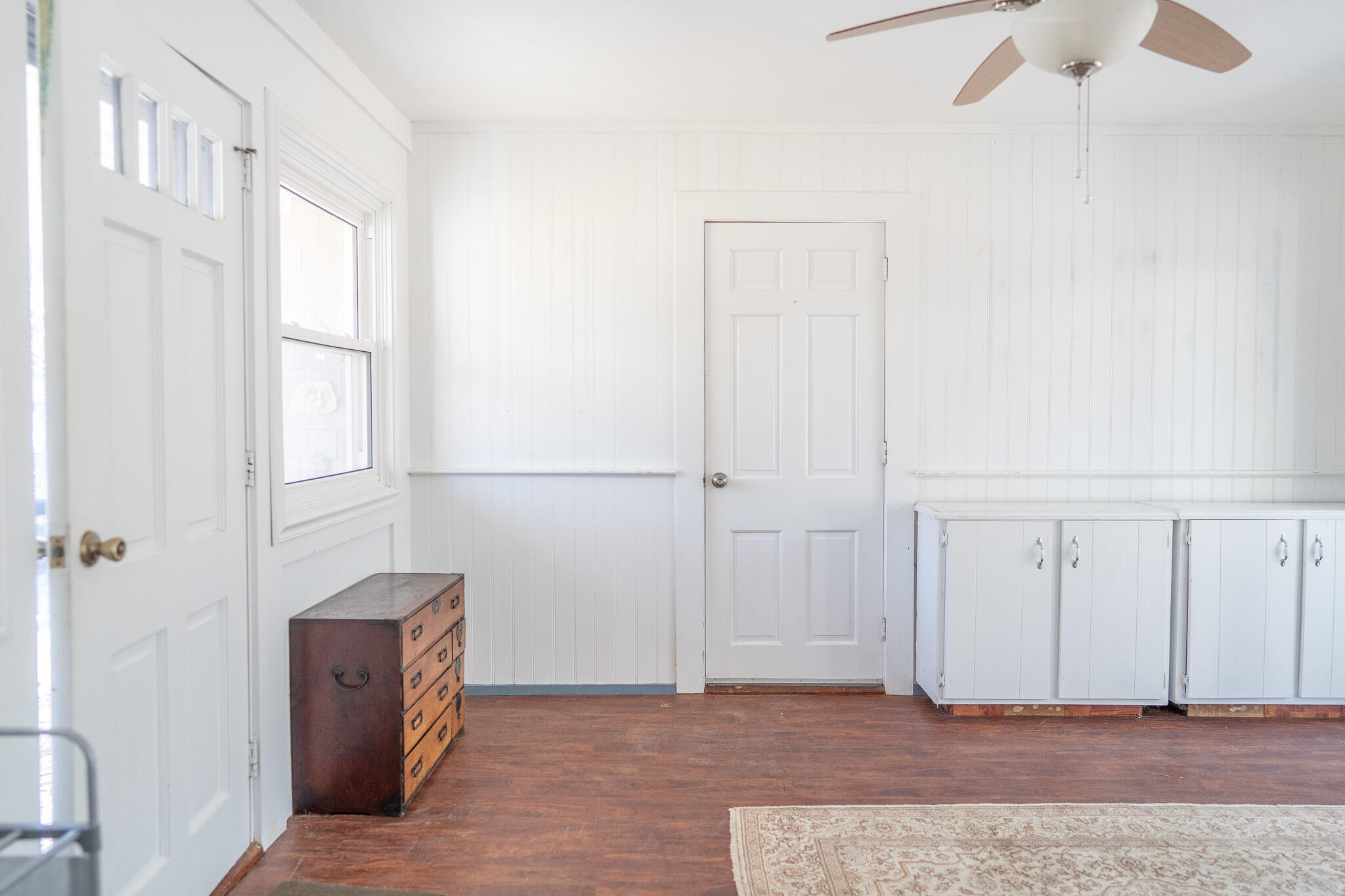 49 Monument View Road East Dennis, MA 02660 - Photo 17 of 52 a view of an empty room with wooden floor and a window