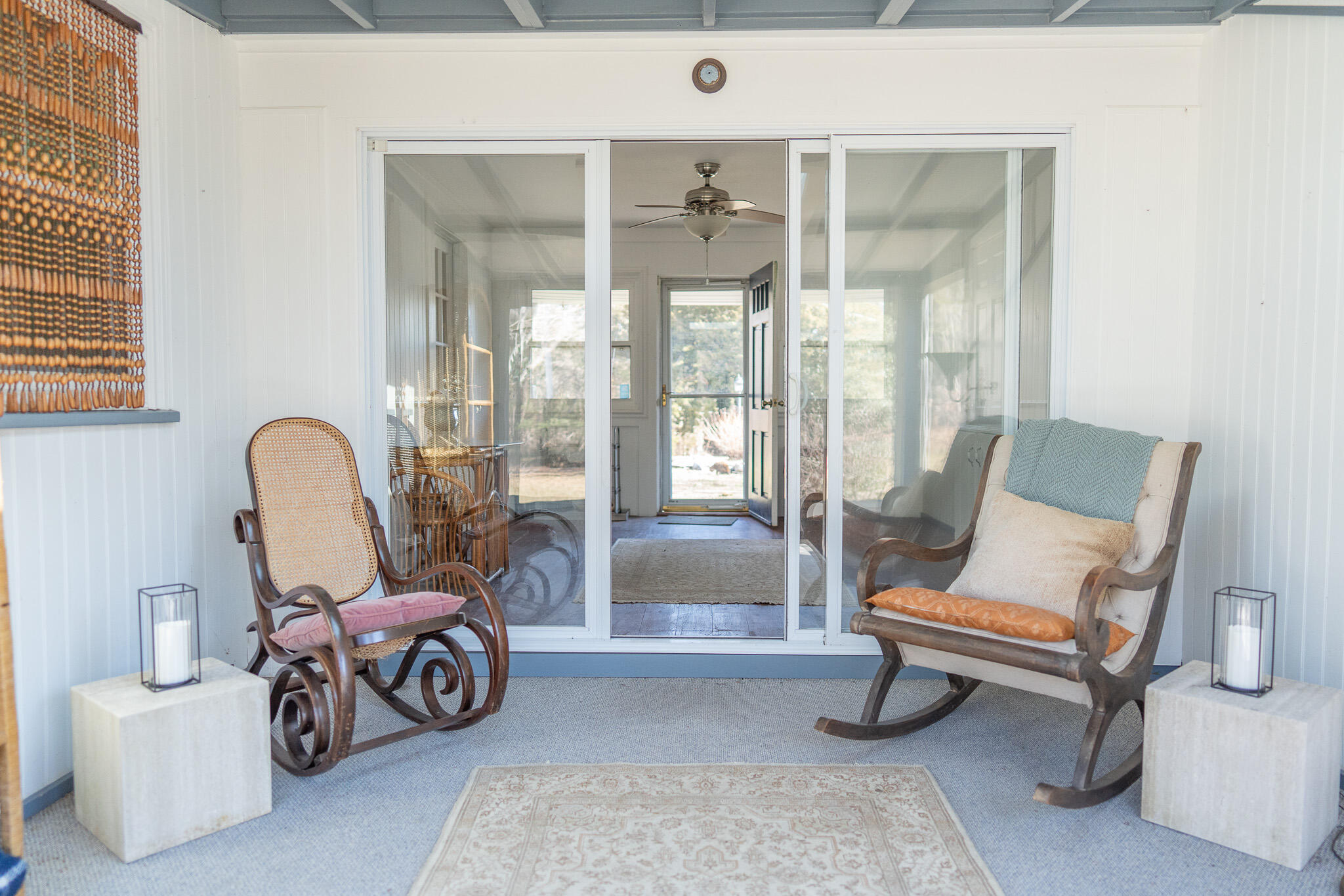 49 Monument View Road East Dennis, MA 02660 - Photo 19 of 52 a living room with furniture and a floor to ceiling window