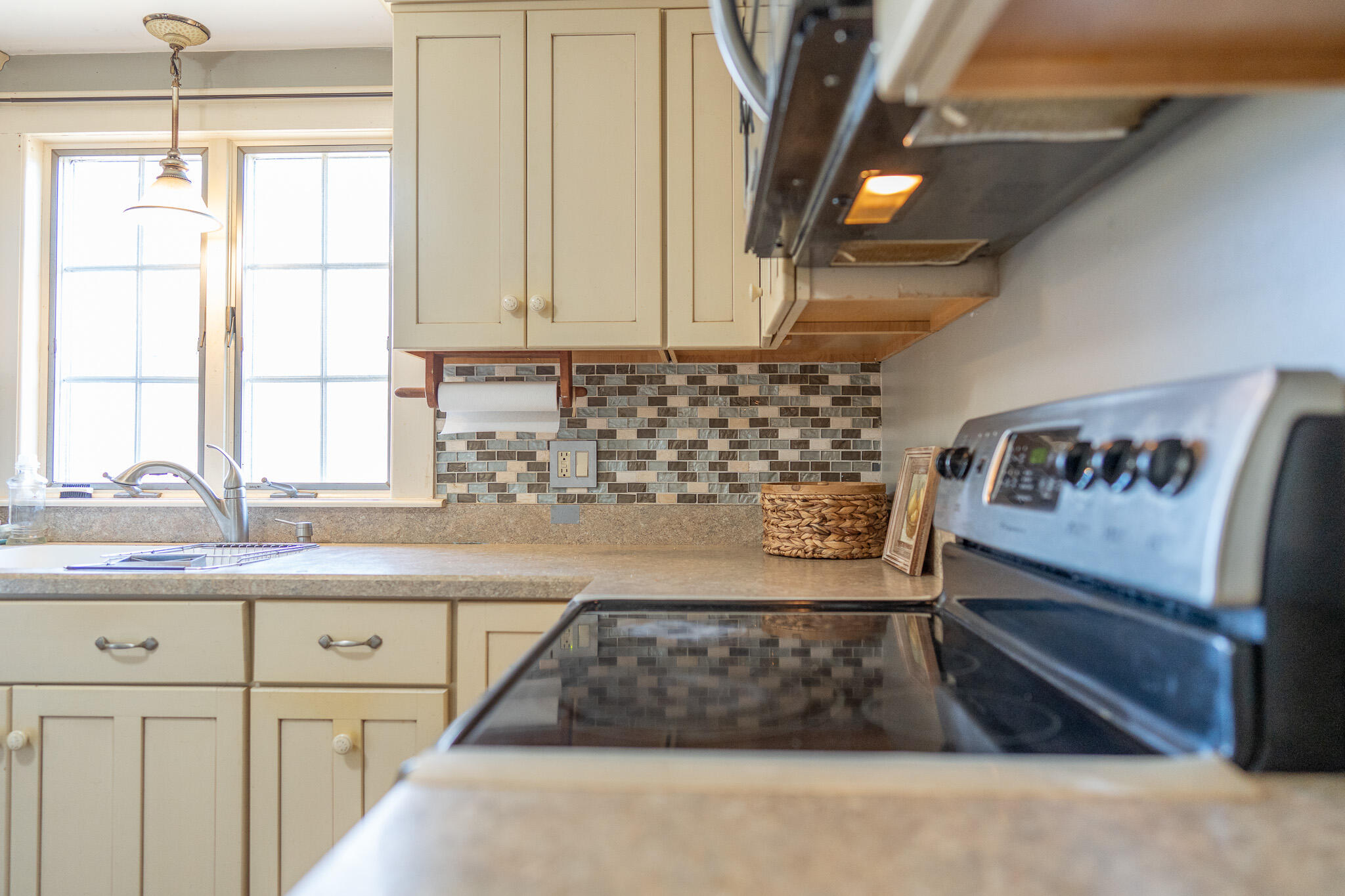 49 Monument View Road East Dennis, MA 02660 - Photo 21 of 52 a kitchen with a sink and cabinets