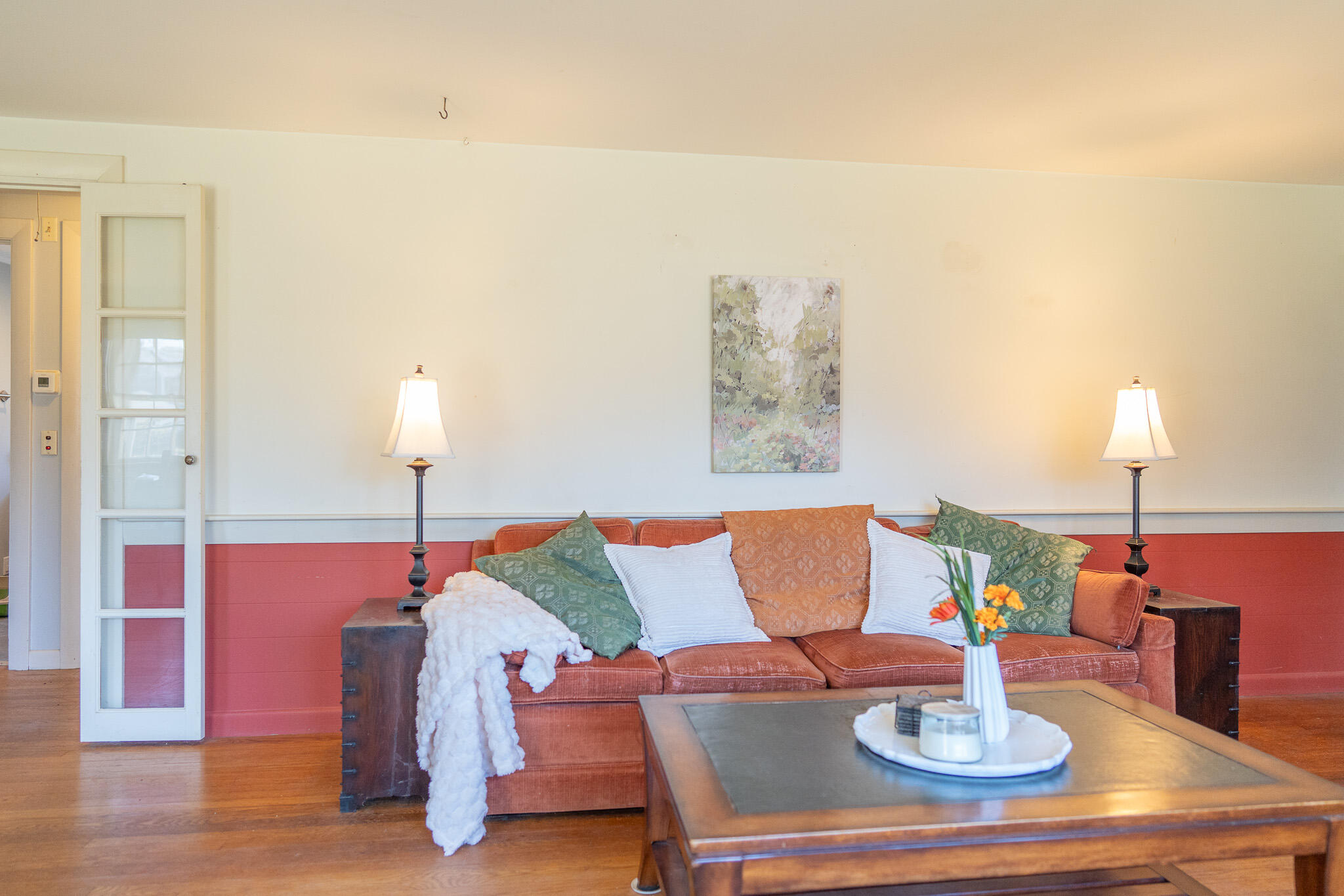 49 Monument View Road East Dennis, MA 02660 - Photo 31 of 52 a living room with furniture and a lamp